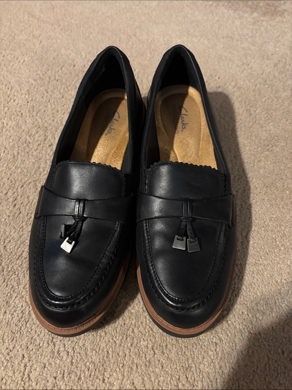 Clarks Black Leather Tassel Slip-On Loafers with Tan Welt